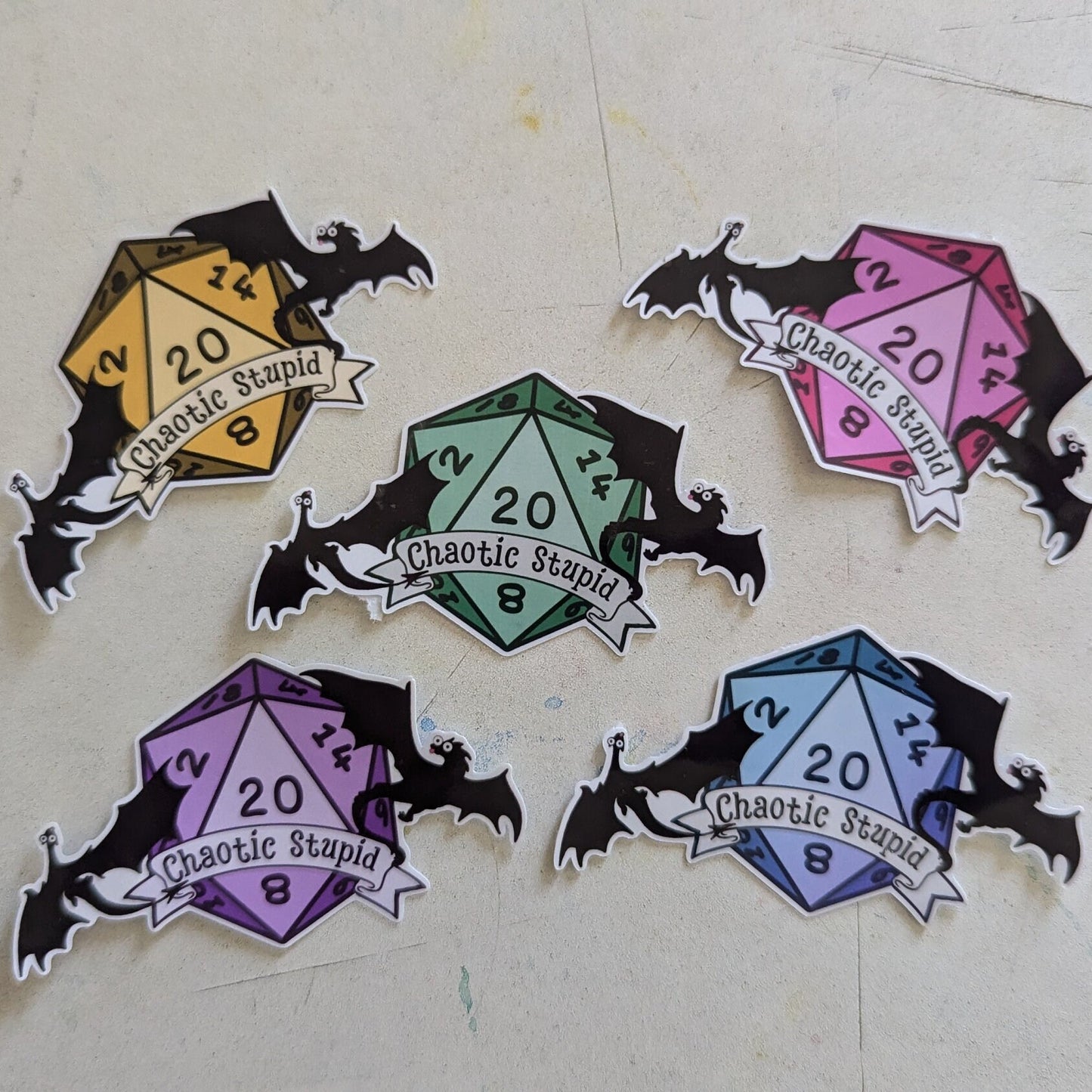 Chaotic Stupid d20 | crit success | silhouette | dragon in flight | waterproof | vinyl | laminated