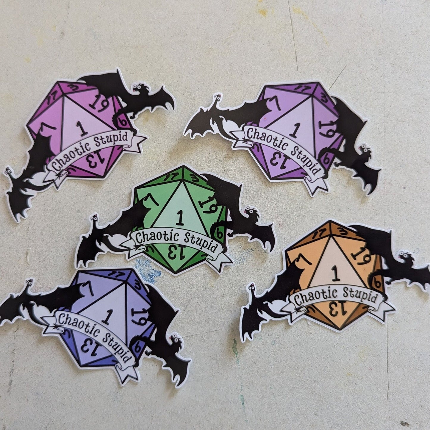 Chaotic Stupid d20 | crit failure | silhouette | dragon in flight | waterproof | vinyl | laminated