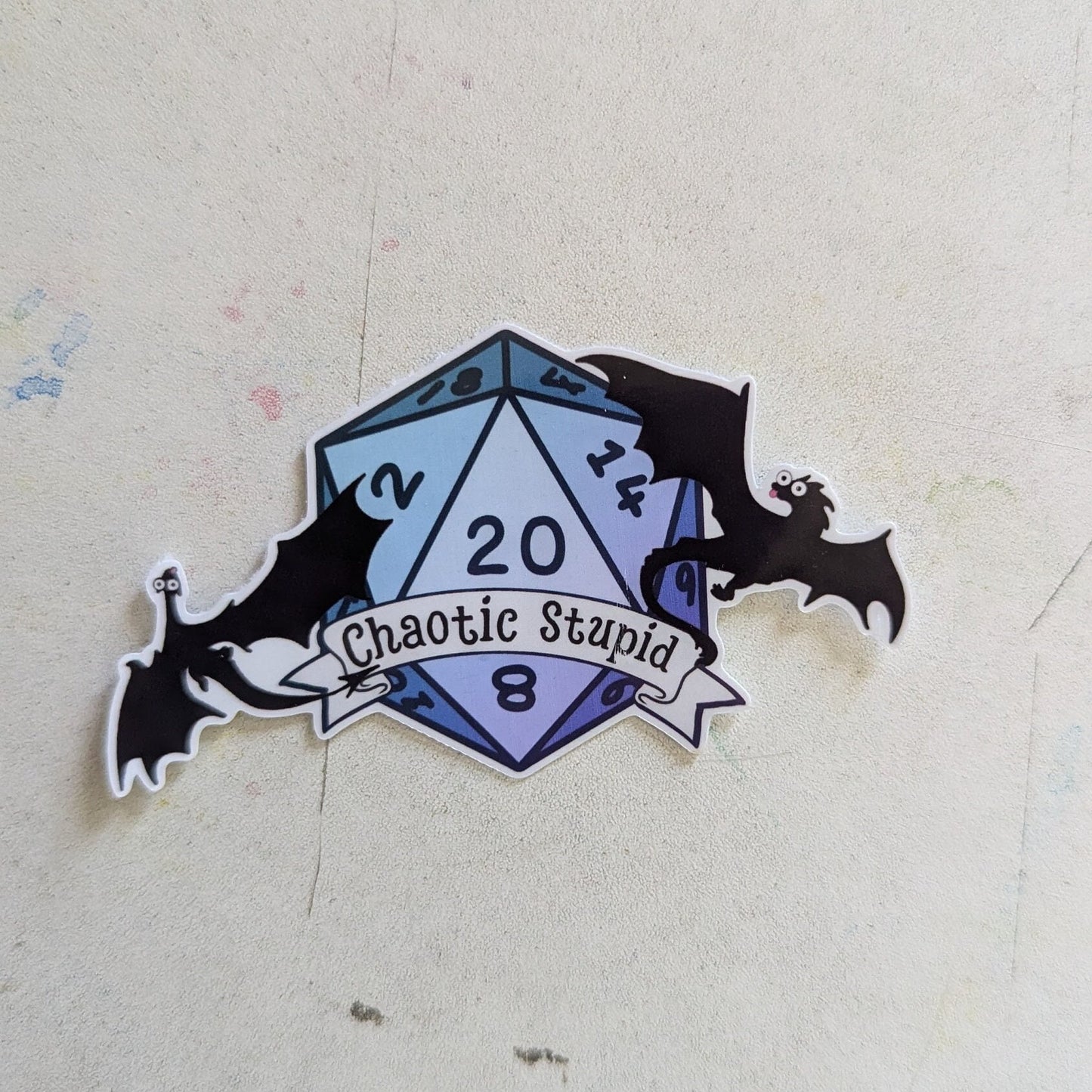 Chaotic Stupid d20 | crit success | silhouette | dragon in flight | waterproof | vinyl | laminated